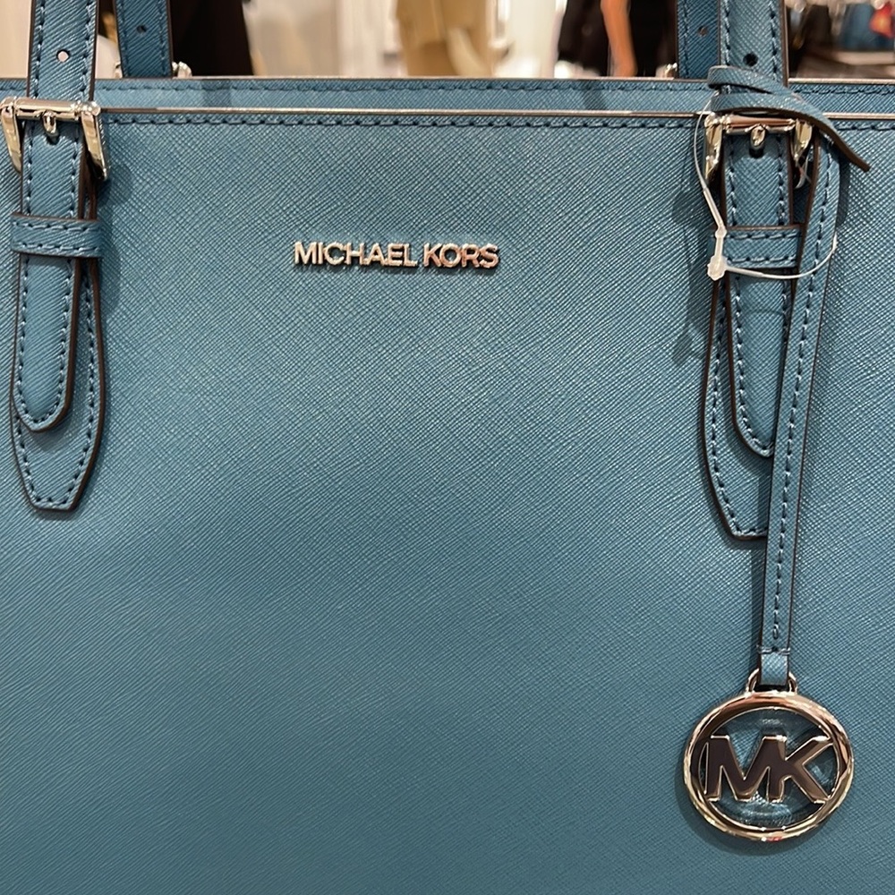 Michael Kors Gilly Large Drawstring Travel Leather Top Zip Tote
 Color: TEAL
NWT - Picture 11 of 16